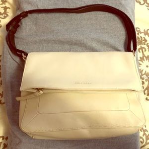 Genuine Cole Haan white and black shoulder bag.